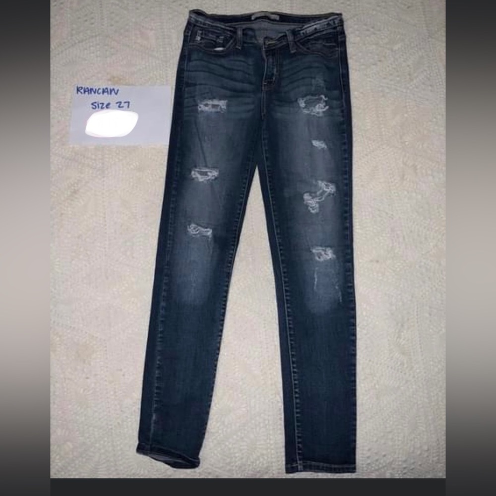 Straight leg distressed medium wash jeans. Women’s size 27